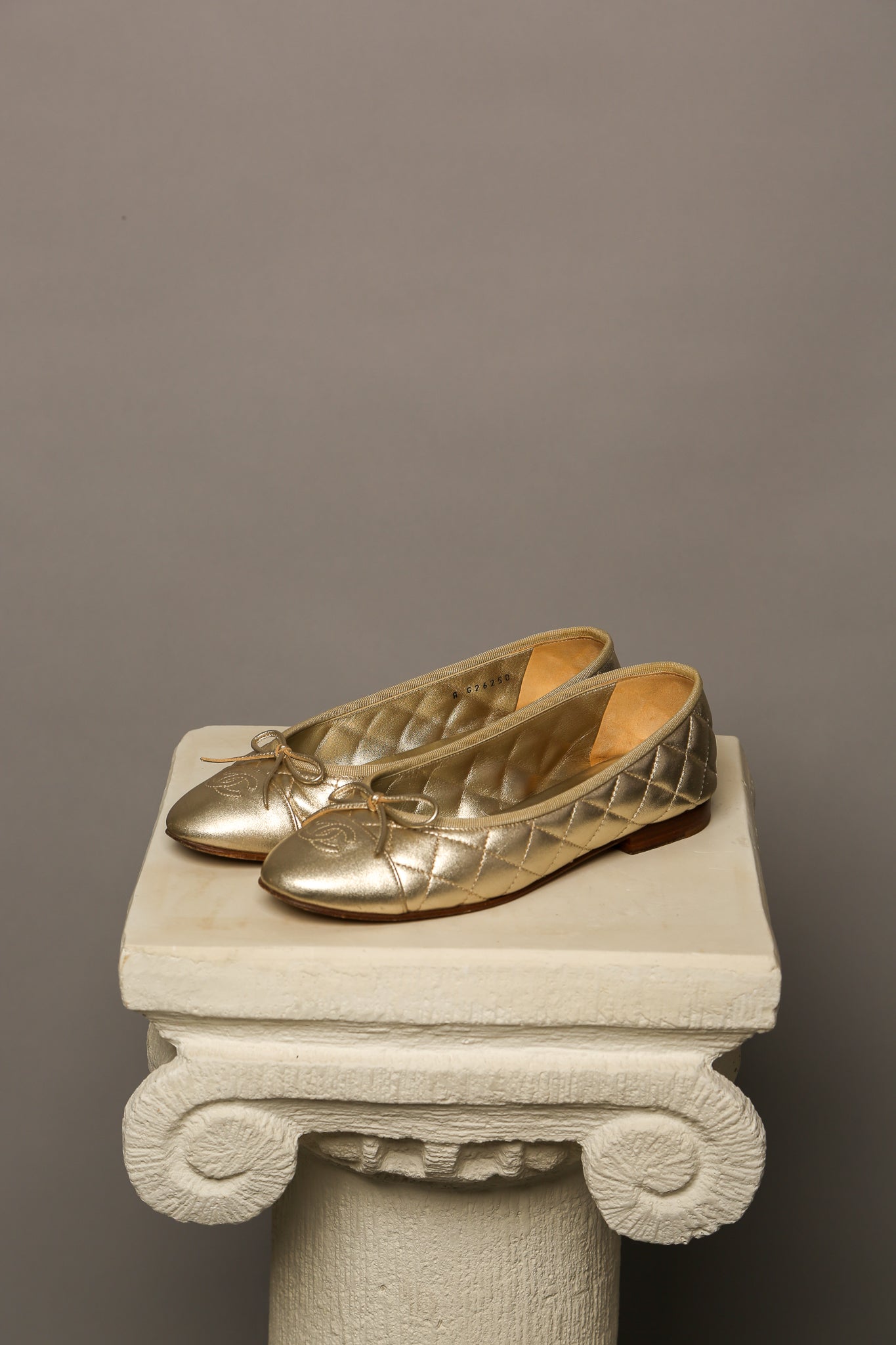 CHANEL Gold Ballet Flats