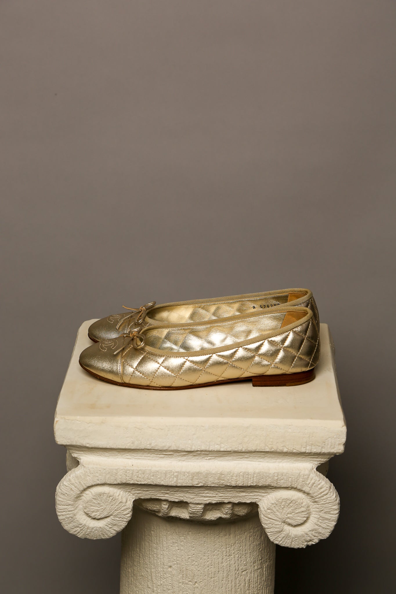CHANEL Gold Ballet Flats