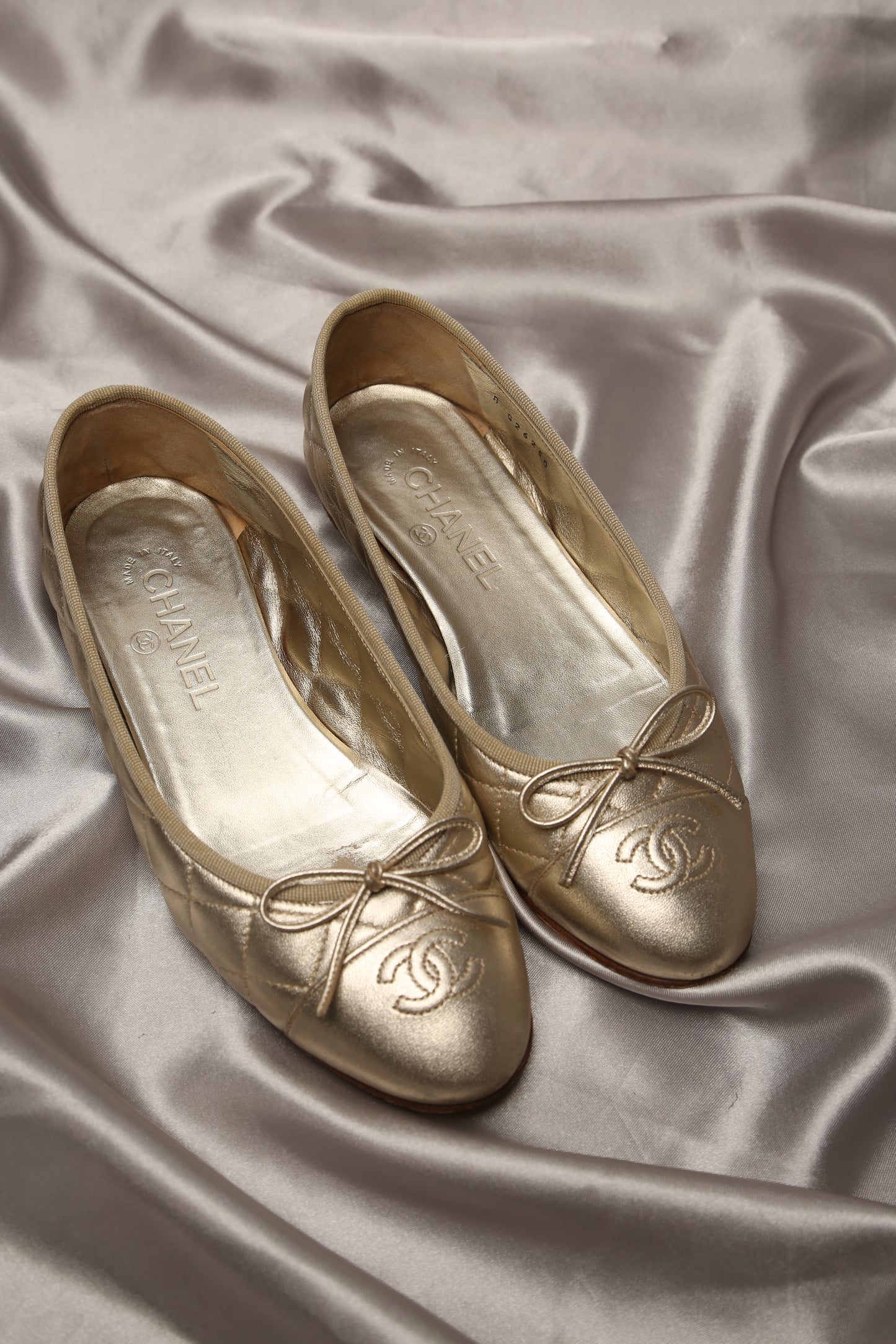 CHANEL Gold Ballet Flats