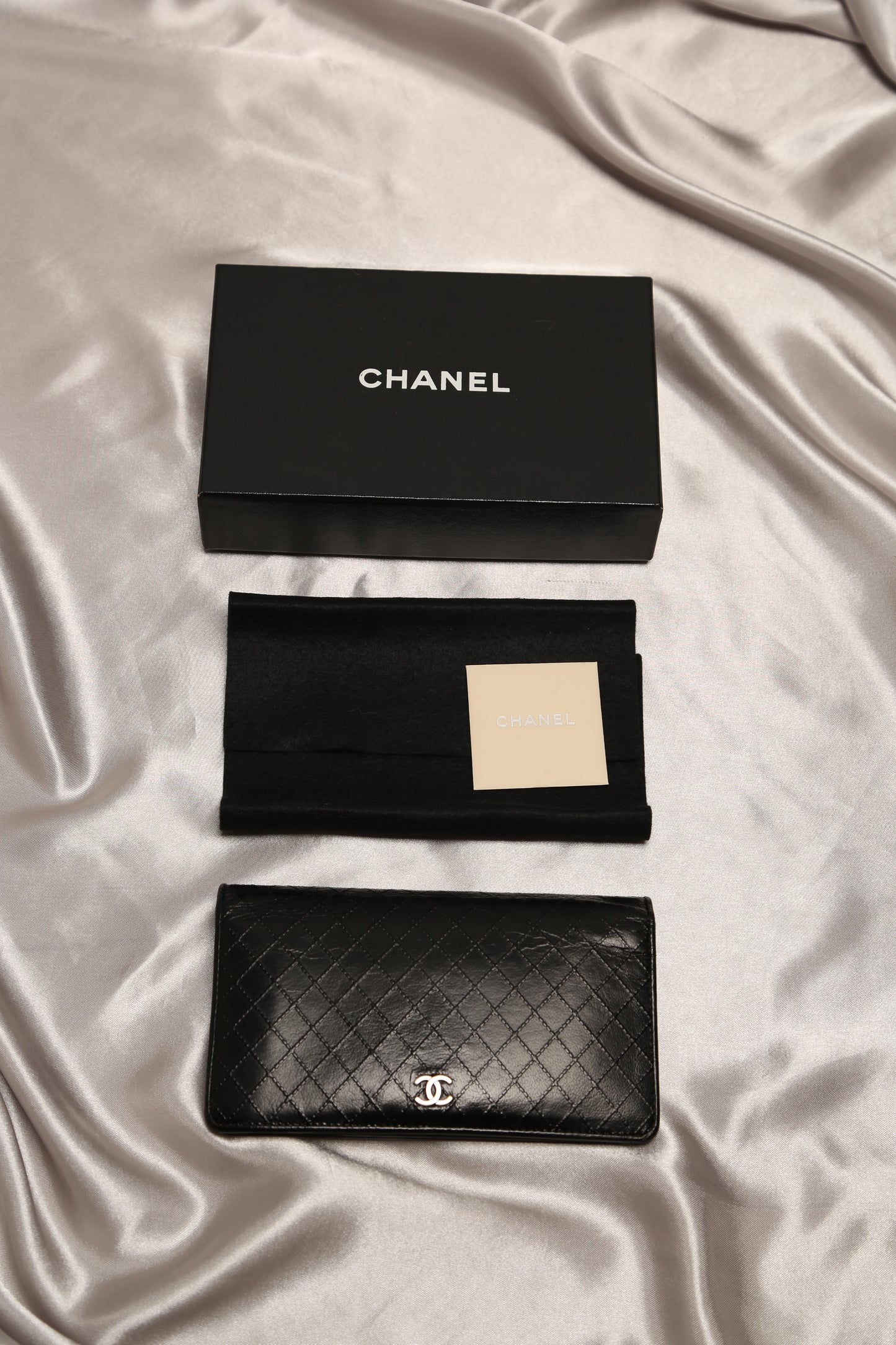 CHANEL Quilted Bifold Wallet