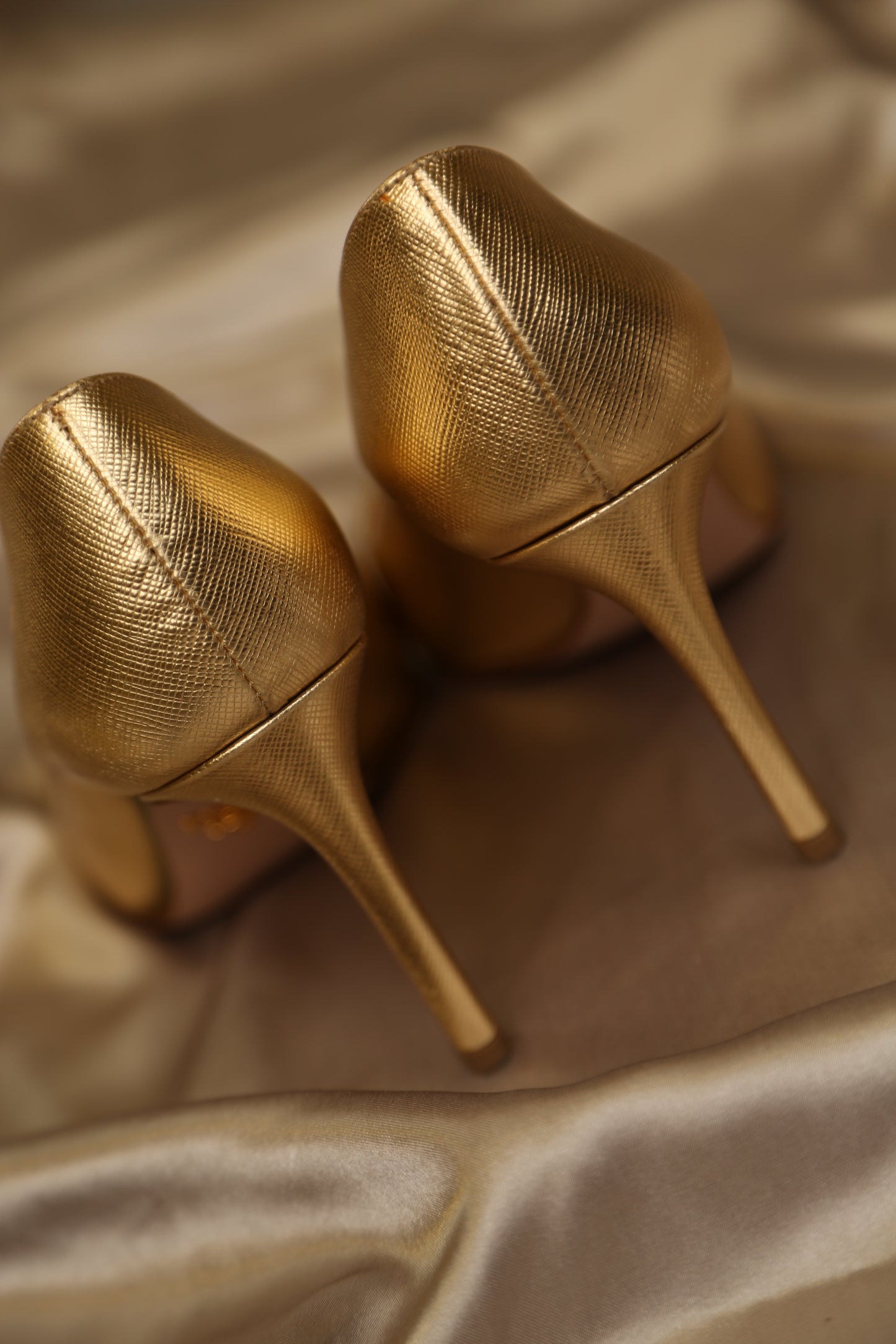 PRADA Gold Saffiano Pumps