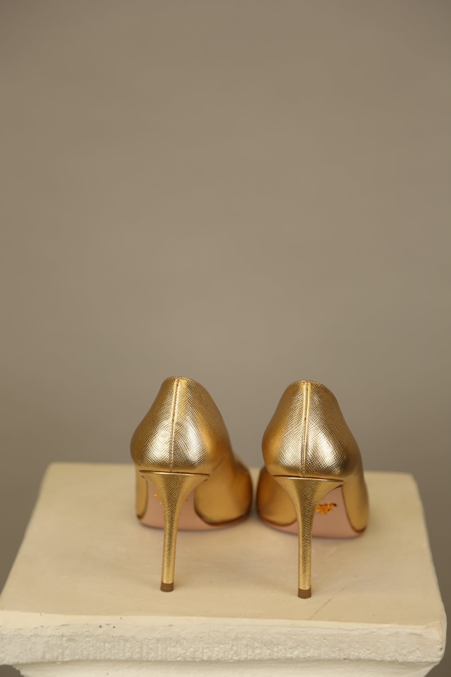 PRADA Gold Saffiano Pumps