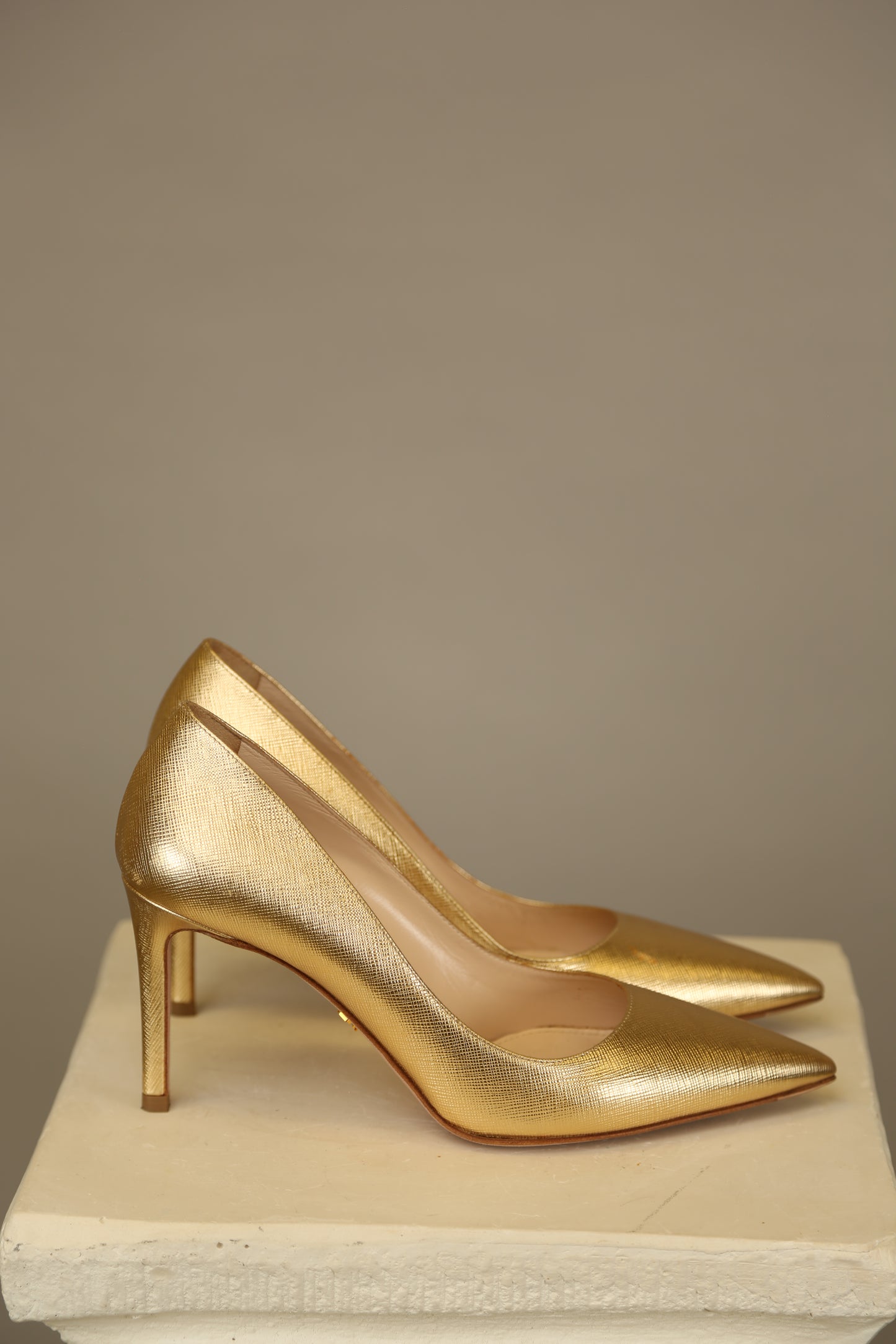 PRADA Gold Saffiano Pumps