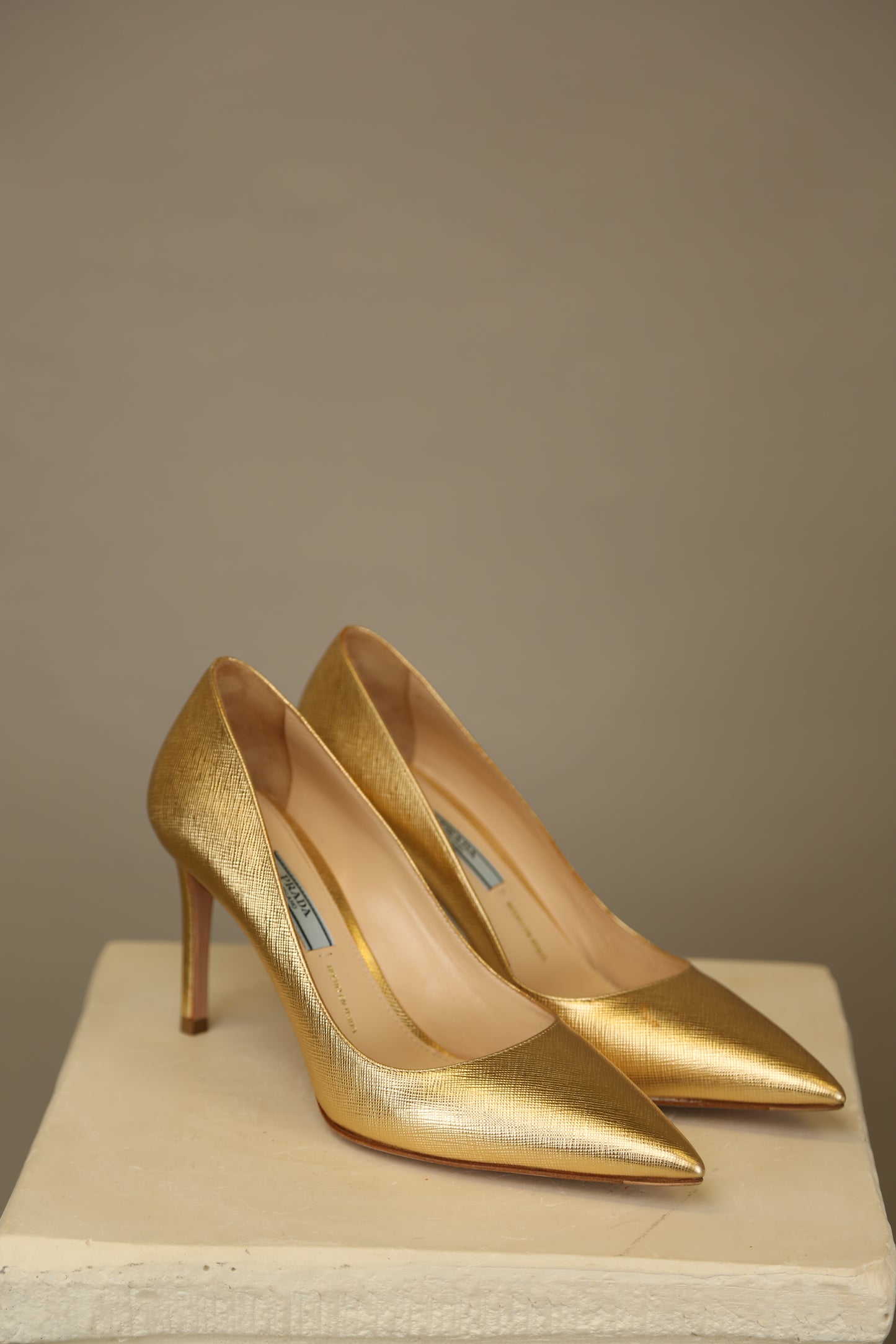 PRADA Gold Saffiano Pumps